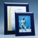 NAVY SURROUND GLASS FRAME FOR 5 INCH x 7 INCH PHOTO, H OR V; SKILLET: INC.