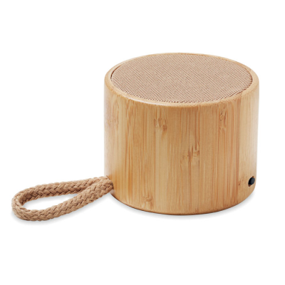 Picture of ROUND BAMBOO CORDLESS SPEAKER in Brown.