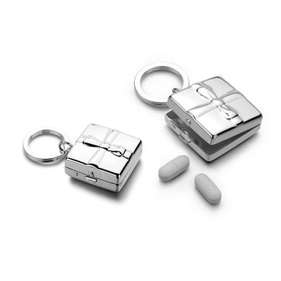 Picture of PILL BOX with Bow Metal Keyring in Silver.