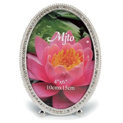 Picture of METAL OVAL PHOTO FRAME with Crystals.