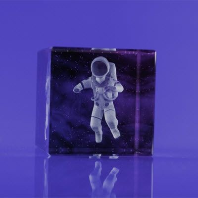 Picture of CRYSTAL GLASS SPACE PAPERWEIGHT OR AWARD.