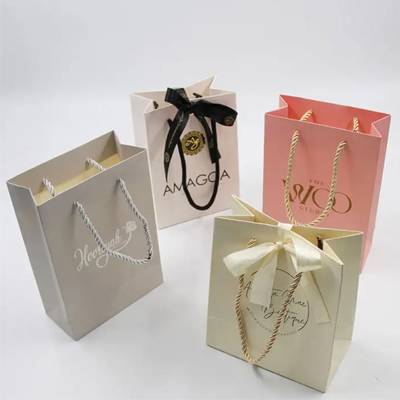 Picture of KENWOOD ROPE HANDLE KRAFT PAPER CARRIER GIFT BAG.