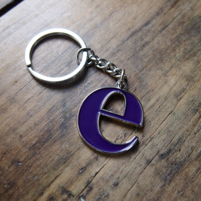 Picture of STAMPED IRON SOFT ENAMEL KEYRING (50MM).