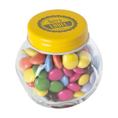 Picture of SMALL GLASS JAR with Milk Chocos in Yellow.