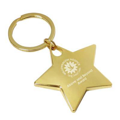 Picture of SHINY GOLD STAR KEYRING.