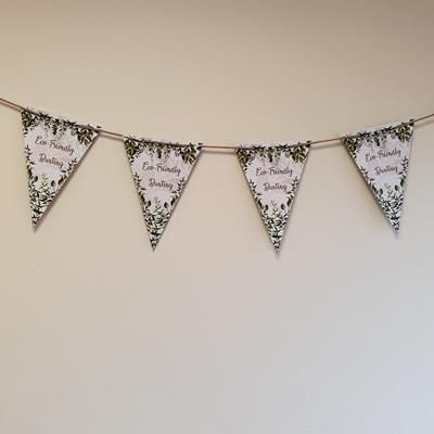 Picture of A5 ECO FRIENDLY PAPER BUNTING ON NATURAL WOOL WEBBING.