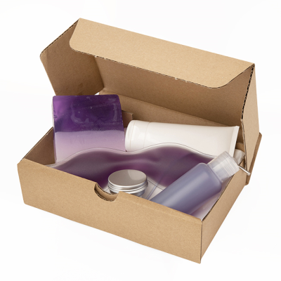 Picture of PURPLE WELLBEING SET in a Brown Mailing Box.