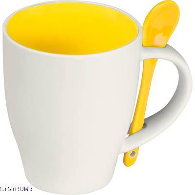 Picture of WHITE PORCELAIN MUG with Yellow Interior.
