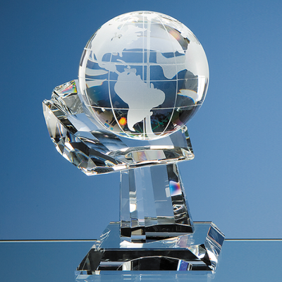 Picture of 10CM OPTICAL CRYSTAL GLOBE ON MOUNTED HAND AWARD.