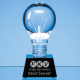 Picture of 6,5CM DIA OPTICAL CRYSTAL LIGHTBULB AWARD MOUNTED ON AN ONYX BLACK CRYSTAL BASE