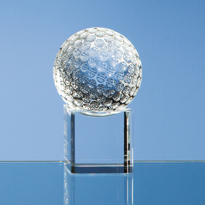 Picture of 6CM OPTICAL CRYSTAL GOLF BALL ON a CLEAR TRANSPARENT CRYSTAL BASE.