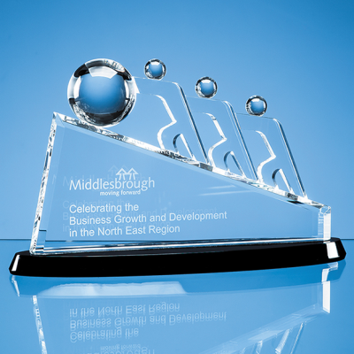 Picture of 32CM OPTICAL CRYSTAL SLOPE TEAMWORK AWARD MOUNTED ON AN ONYX BLACK CRYSTAL BASE.