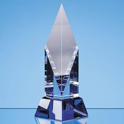 Picture of CLEAR TRANSPARENT OPTICAL CRYSTAL DIAMOND MOUNTED on a Cobalt Blue Base.