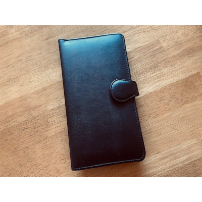 Picture of PLANT BASED FAUX LEATHER TRAVEL WALLET.