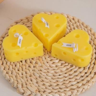 Picture of HEART CHEESE SHAPE CANDLE.
