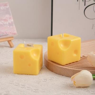 Picture of SQUARE CHEESE SHAPE CANDLE.