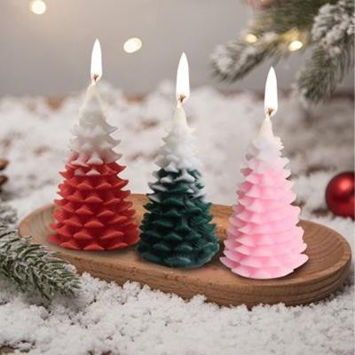Picture of CEDAR CHRISTMAS TREE SHAPE CANDLE.