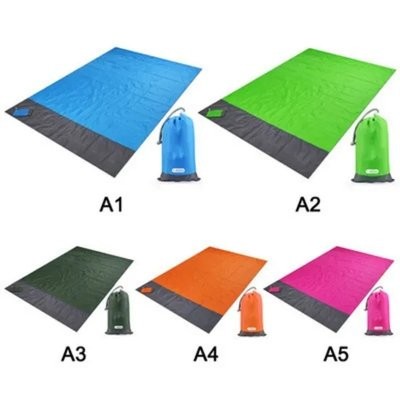 Picture of PORTABLE LIGHTWEIGHT BEACH PICNIC BLANKET with Stakes.